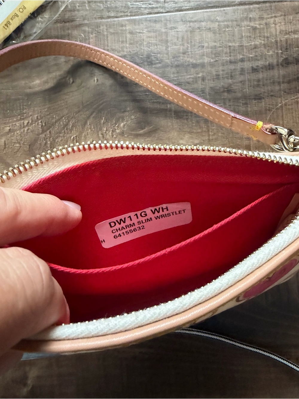 Dooney & Bourke Disney Cream Wristlet w/ Multicolor Charm Print, Like New w/tags - Picture 5 of 7